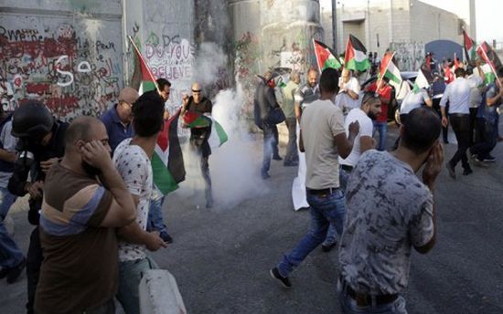 إصابة عشرات الفلسطينيين في مواجهات مع الاحتلال الإسرائيلي بالضفة