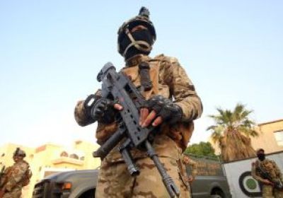 القوات الأمنية العراقية تفكك عبوة ناسفة مزروعة داخل حقل