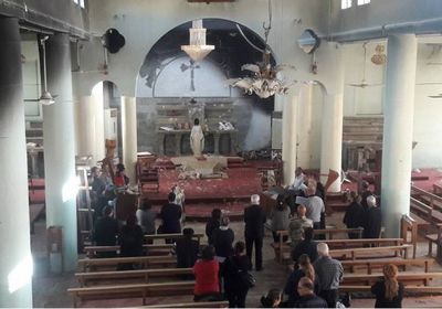 مسيحيو نينوى العراقية يحتفون بإعادة إعمار 3 كنائس دمرها داعش في 2014