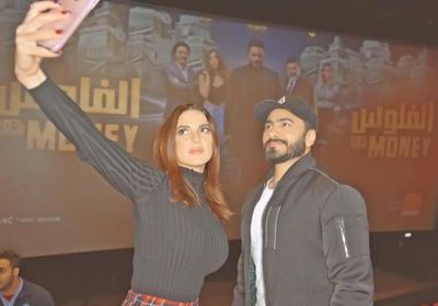 بالصور.. تامر حسني يحضر فيلم "الفلوس" بصحبة جمهوره 
