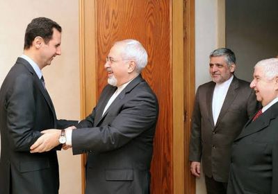 بالكمامات.. الأسد يستقبل وزير الخارجية الإيراني (صور)