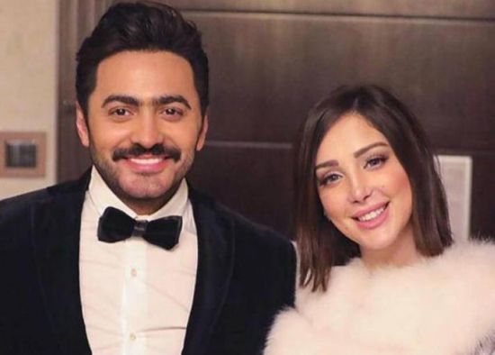 تامر حسني يرقص مع زوجته بسمة بوسيل على أنغام bella ciao (فيديو)