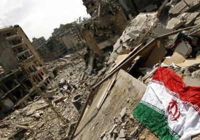 المليشيات الإيرانية في سوريا تنزل الأعلام من مقارها خشية الاستهداف الجوي