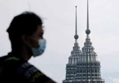  ماليزيا تسجل 7105 إصابات جديدة بكورونا