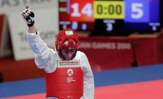 عشيش وجوليانا يحملان علم الأردن في طوكيو 2020