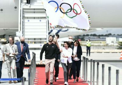  العلم الأولمبي يرفرف في باريس بعد 100 عام من الغياب