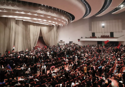 "المندلاوي" العراقي يدعو الحكومة لتنفيذ قرار إخراج القوات الأجنبية من العراق