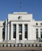 الفيدرالي الأمريكي يحذر من ضغوط الفائدة المرتفعة على الاقتصاد