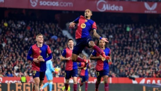    برباعية برشلونة يهزم إشبيلية في الليغا