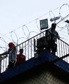 شرطة جواتيمالا تستعيد السيطرة على سجن من ثلاثة جرى احتجاز رهائن فيها