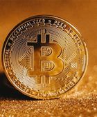 ستاندرد تشارترد يتوقع تراجع البيتكوين لـ 50 ألف دولار