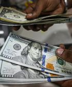 الدولار يتجه لتسجيل أكبر مكسب أسبوعي في عام