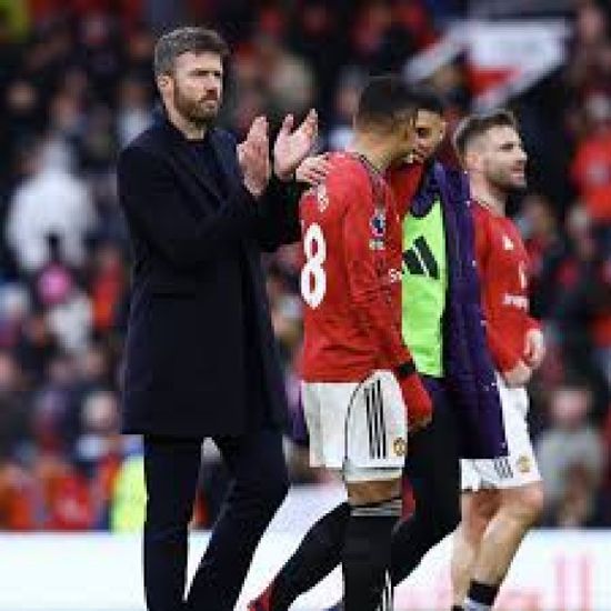 كاريك يتجاهل دعوة روني لتعيينه مدربا دائما ليونايتد