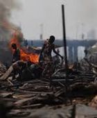 نيجيريا تدافع عن غارة دامية على قرية يسيطر عليها متمردون