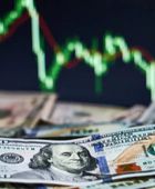 الدولار يحلق قرب قمة أسبوعين تزامنا مع تراجع الين